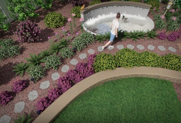 Beautiful garden with stone pathways, flowering plants, and a water feature showcasing professional Landscape Installation Services for a serene outdoor living space.